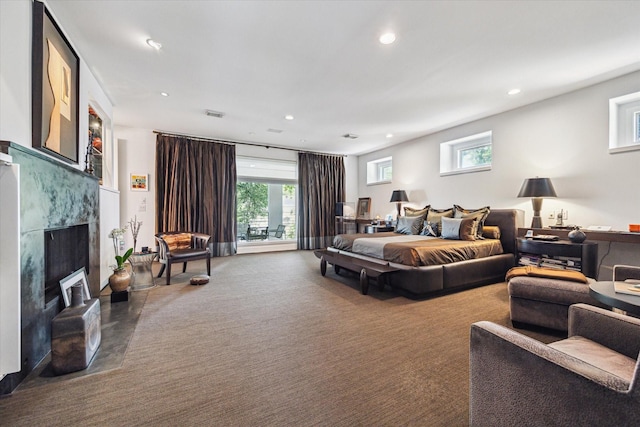2409 Maconda Ln, Houston, TX 77027 - bedroom featuring a fireplace, recessed lighting, and carpet floors