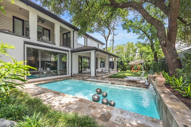 2409 Maconda Ln, Houston, TX 77027 - swimming pool featuring a patio and a ceiling fan