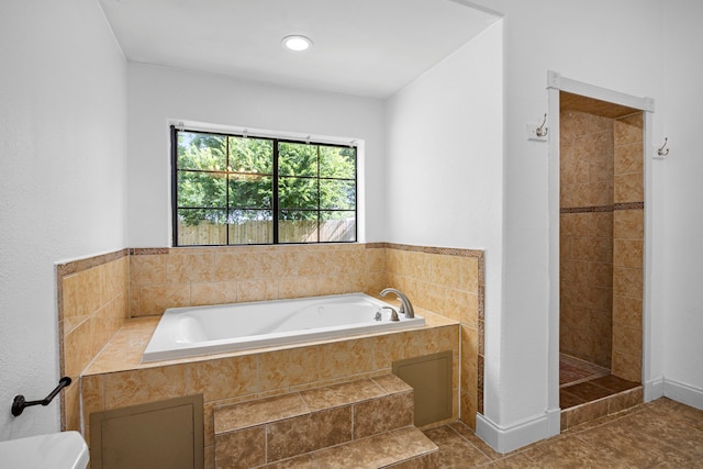 15810 Juneau Ln, Jersey Village, TX 77040 - full bath with a garden tub, a shower stall, and tile patterned flooring