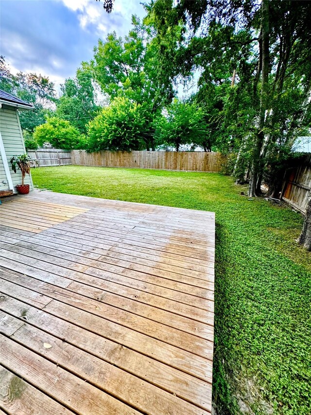 15810 Juneau Ln, Jersey Village, TX 77040 - wooden terrace featuring a fenced backyard