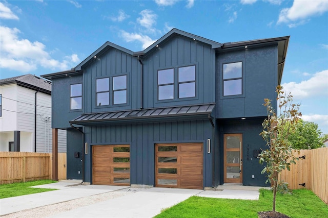7906 Brandon St, Houston, TX 77051 - modern home featuring a standing seam roof, a garage, driveway, a metal roof, and board and batten siding