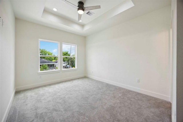 7906 Brandon St, Houston, TX 77051 - spare room with carpet flooring, a raised ceiling, a ceiling fan, and recessed lighting