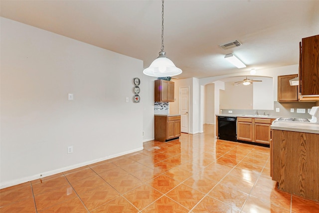 14006 Marners Ct, Houston, TX 77014 - kitchen featuring dishwasher, white range oven, arched walkways, light countertops, and light tile patterned floors