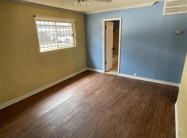5617 Bissonnet St Unit 104, Houston, TX 77081 - unfurnished room featuring crown molding, wood finished floors, and a ceiling fan