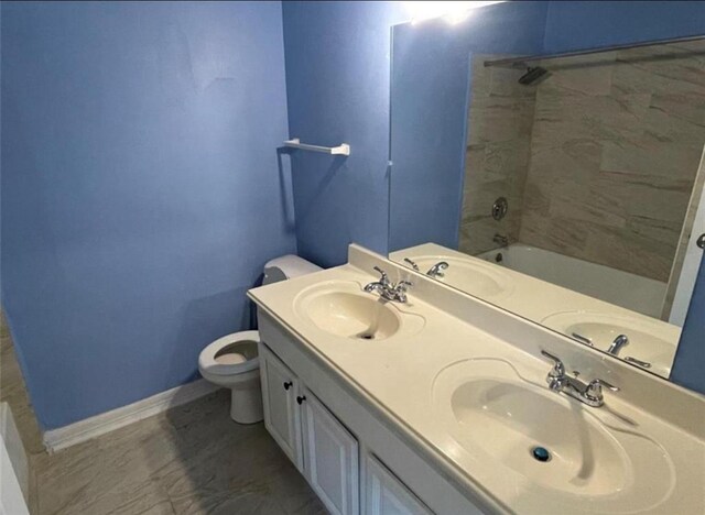 5617 Bissonnet St Unit 104, Houston, TX 77081 - full bathroom with double vanity and tub / shower combination