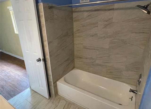 5617 Bissonnet St Unit 104, Houston, TX 77081 - full bathroom featuring bathing tub / shower combination and baseboards