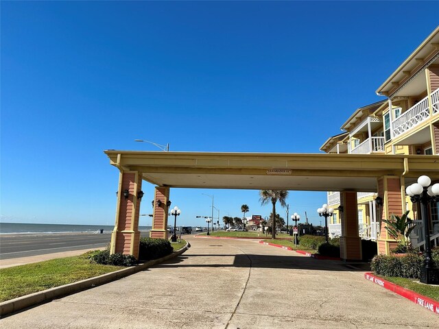 6300 Seawall Blvd Unit 9109, Galveston, TX 77551 - view of concrete road with street lights and curbs