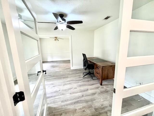 29019 Elmwood Dr, Shenandoah, TX 77381 - office space with wood finished floors and ceiling fan