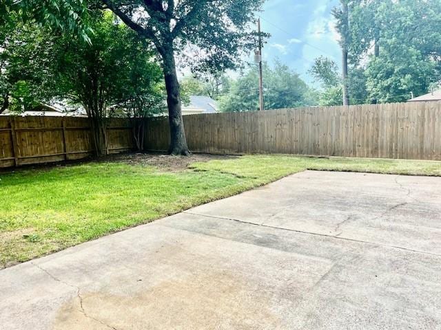 29019 Elmwood Dr, Shenandoah, TX 77381 - fenced backyard with a patio area