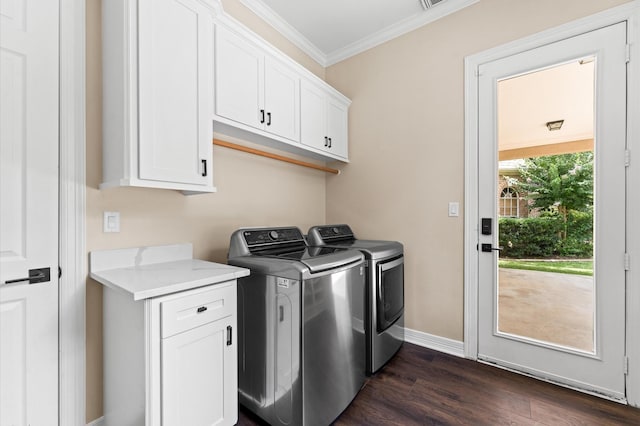 18 Sullivans Ct, Missouri City, TX 77459 - laundry room featuring washing machine and clothes dryer, crown molding, cabinet space, and dark wood-style flooring