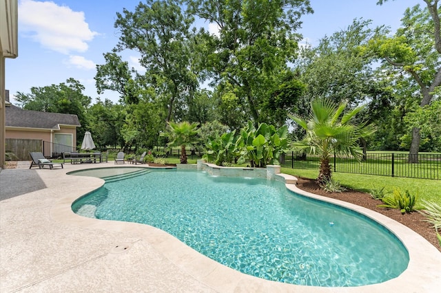 18 Sullivans Ct, Missouri City, TX 77459 - view of pool featuring a patio area and view of wooded area