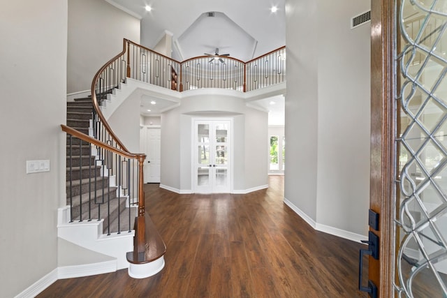 18 Sullivans Ct, Missouri City, TX 77459 - foyer entrance featuring wood finished floors, a ceiling fan, stairs, and a towering ceiling