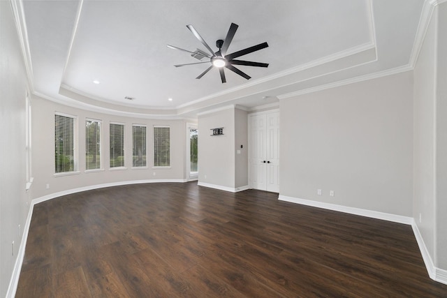 18 Sullivans Ct, Missouri City, TX 77459 - unfurnished living room featuring a raised ceiling, ceiling fan, dark wood finished floors, and ornamental molding