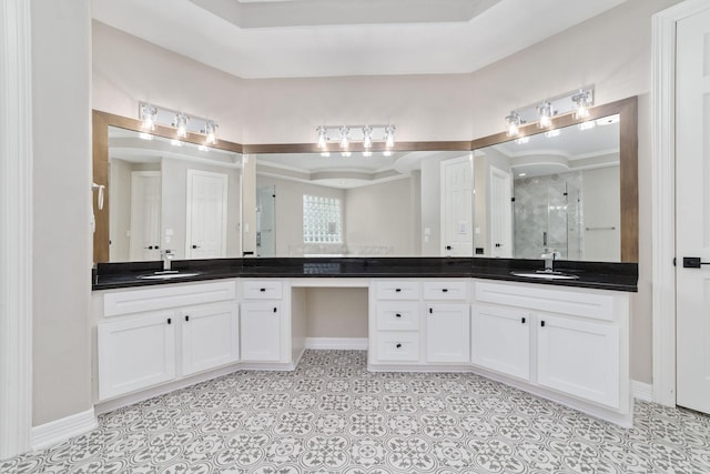 18 Sullivans Ct, Missouri City, TX 77459 - bathroom with a shower stall, vanity, and tile patterned flooring