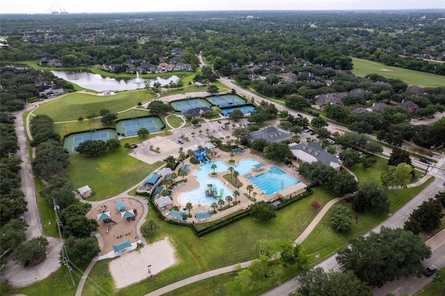 18 Sullivans Ct, Missouri City, TX 77459 - aerial view of property's location featuring a nearby body of water and a pool area