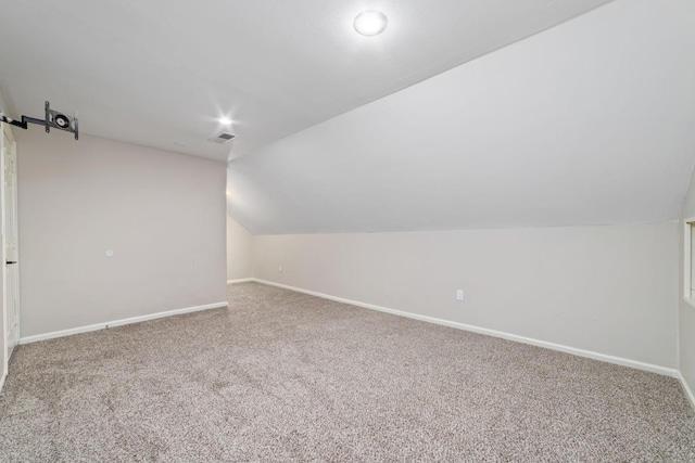 18 Sullivans Ct, Missouri City, TX 77459 - bonus room featuring lofted ceiling and carpet flooring