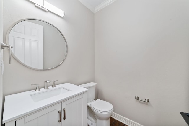 18 Sullivans Ct, Missouri City, TX 77459 - bathroom featuring ornamental molding, vanity, and wood finished floors