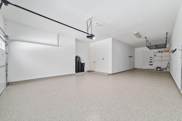 18 Sullivans Ct, Missouri City, TX 77459 - garage featuring a garage door opener