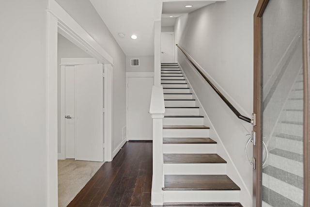 703 Schwartz St, Houston, TX 77020 - staircase with recessed lighting and hardwood / wood-style floors