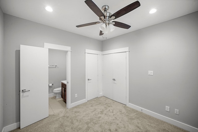 703 Schwartz St, Houston, TX 77020 - unfurnished bedroom with light carpet, ensuite bathroom, recessed lighting, and a ceiling fan