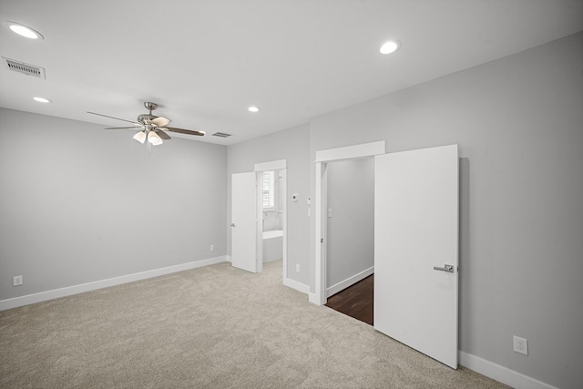 703 Schwartz St, Houston, TX 77020 - unfurnished bedroom with carpet, recessed lighting, ensuite bath, and ceiling fan