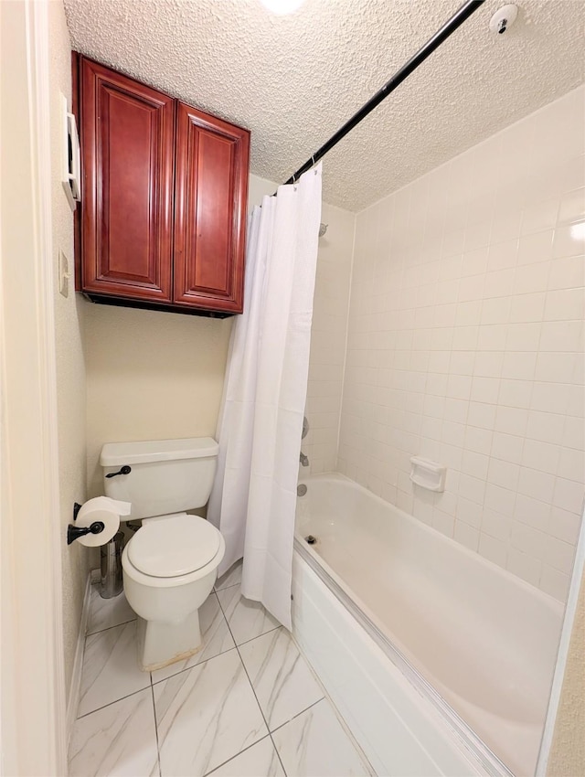 2750 Holly Hall St Unit 1504, Houston, TX 77054 - full bath with shower / bathtub combination with curtain, marble finish floors, and a textured ceiling