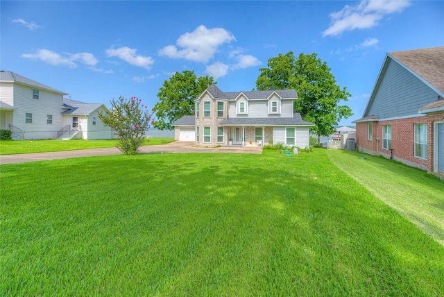 440 Lakeview Drive Loop, Coldspring, TX 77331 - traditional-style home with concrete driveway and a front lawn