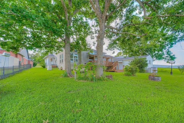 440 Lakeview Drive Loop, Coldspring, TX 77331 - view of yard featuring a wooden deck