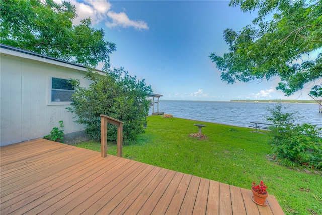 440 Lakeview Drive Loop, Coldspring, TX 77331 - wooden terrace featuring a water view and a yard