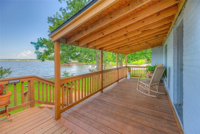 440 Lakeview Drive Loop, Coldspring, TX 77331 - wooden terrace with a water view