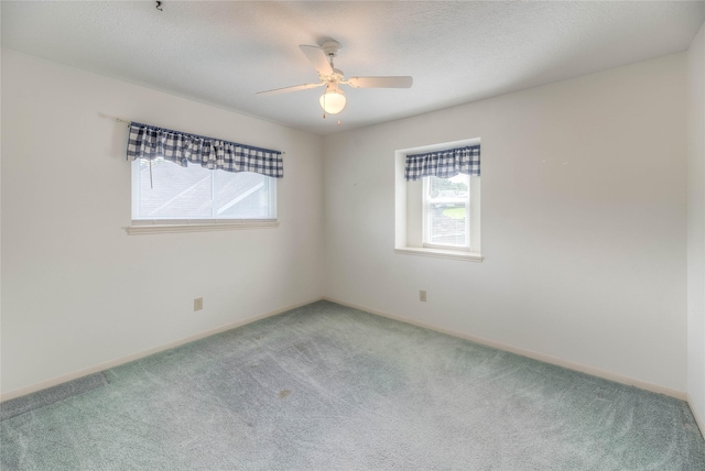 440 Lakeview Drive Loop, Coldspring, TX 77331 - spare room featuring carpet flooring and a ceiling fan