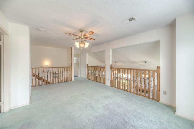 440 Lakeview Drive Loop, Coldspring, TX 77331 - unfurnished room featuring ceiling fan, carpet, and a textured ceiling