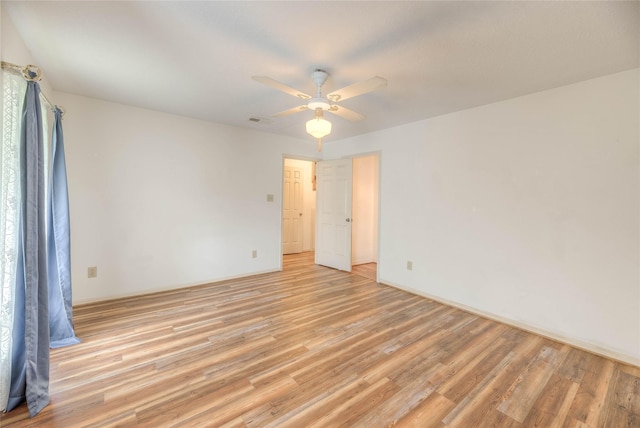 440 Lakeview Drive Loop, Coldspring, TX 77331 - spare room featuring light wood finished floors and a ceiling fan