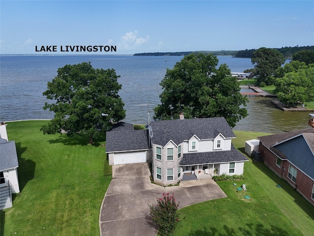 440 Lakeview Drive Loop, Coldspring, TX 77331 - aerial view of property and surrounding area featuring a large body of water