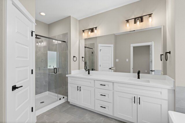 2208 Mansfield, Houston, TX 77091 - full bath featuring a stall shower, double vanity, recessed lighting, and tile patterned flooring