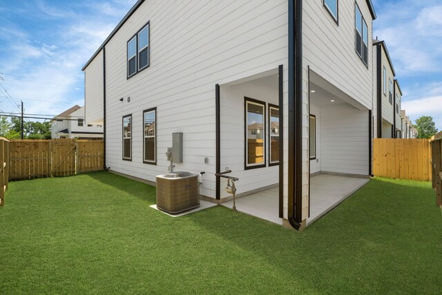 2208 Mansfield, Houston, TX 77091 - rear view of house featuring a patio and a fenced backyard