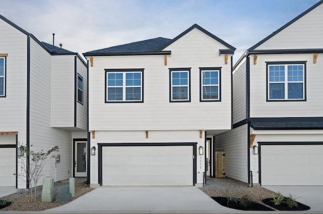 5935 Cebra, Houston, TX 77091 - view of front facade with an attached garage and driveway