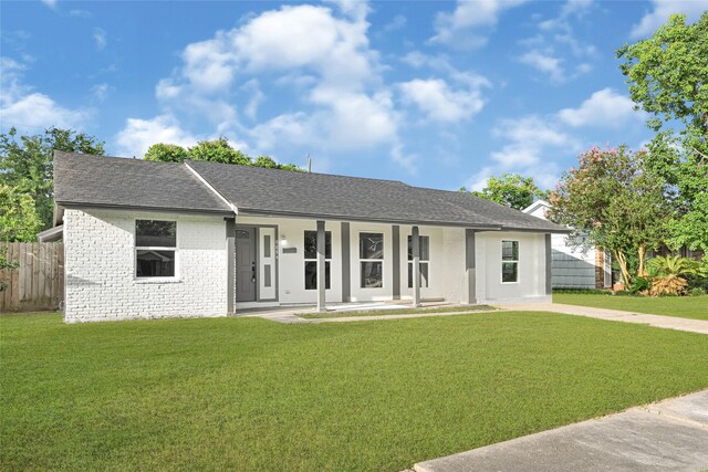 5854 Schevers St, Houston, TX 77033 - ranch-style home with covered porch and roof with shingles