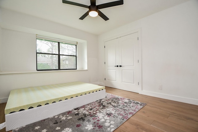 2826 Durban Dr, Houston, TX 77043 - bedroom with wood finished floors and ceiling fan