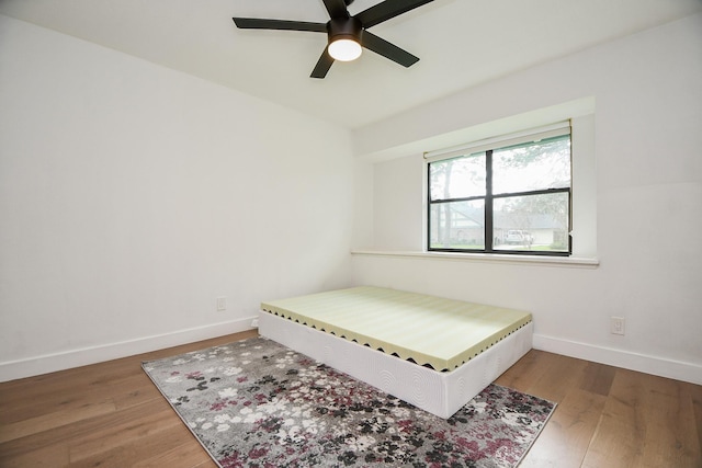 2826 Durban Dr, Houston, TX 77043 - bedroom featuring wood finished floors and a ceiling fan