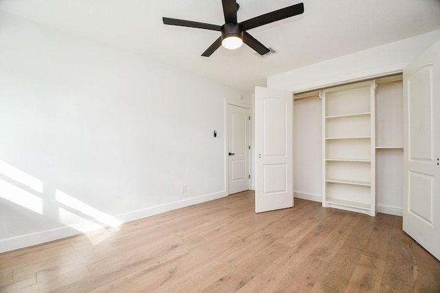 2826 Durban Dr, Houston, TX 77043 - unfurnished bedroom with light wood-type flooring, a closet, and a ceiling fan