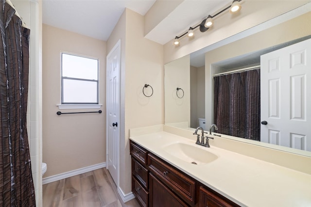 7238 N Hearthstone Green Dr, Houston, TX 77095 - bathroom with vanity and wood finished floors