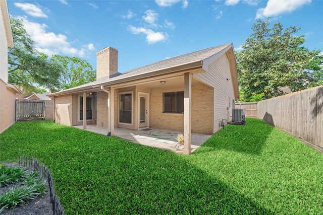 7238 N Hearthstone Green Dr, Houston, TX 77095 - rear view of property with brick siding, a chimney, a fenced backyard, and a patio