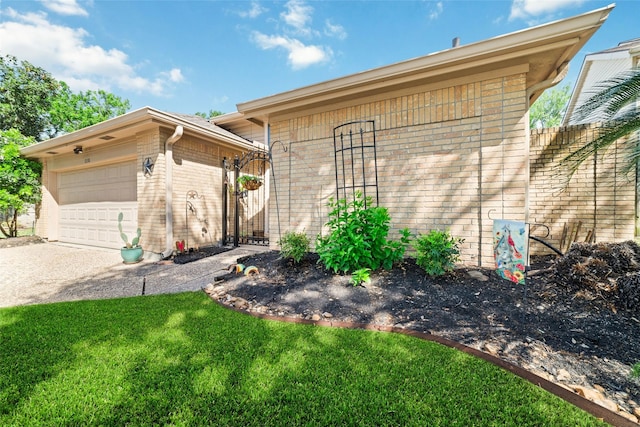 7238 N Hearthstone Green Dr, Houston, TX 77095 - view of side of property featuring brick siding, concrete driveway, a garage, a yard, and an outdoor structure