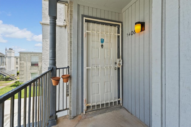 6606 De Moss Dr Unit 1406, Houston, TX 77074 - view of exterior entry with a balcony