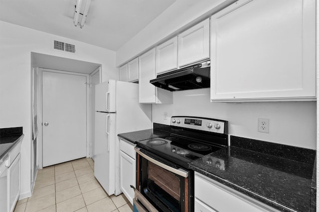 6606 De Moss Dr Unit 1406, Houston, TX 77074 - kitchen with stainless steel range with electric cooktop, under cabinet range hood, white cabinets, dark stone countertops, and light tile patterned flooring