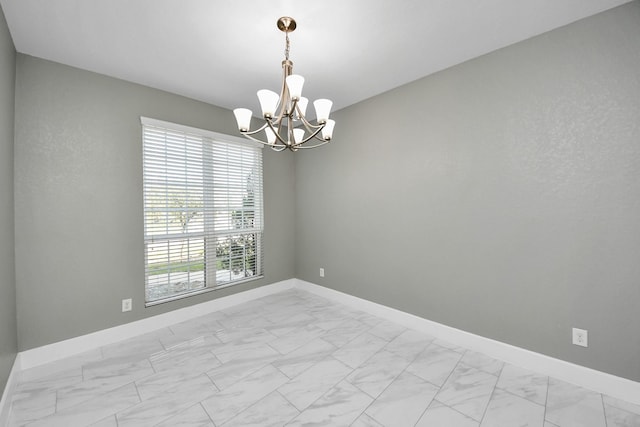 14722 Scenic Sky Way, Houston, TX 77049 - unfurnished room featuring light marble finish floors and a chandelier