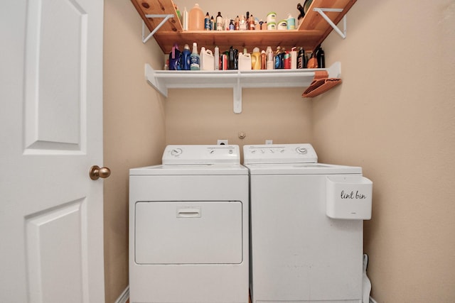 20310 Port Bishop Ln, Richmond, TX 77407 - laundry area with washer and dryer