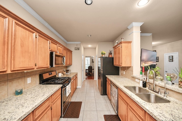 20310 Port Bishop Ln, Richmond, TX 77407 - kitchen featuring stainless steel appliances, decorative backsplash, light tile patterned floors, recessed lighting, and light stone counters