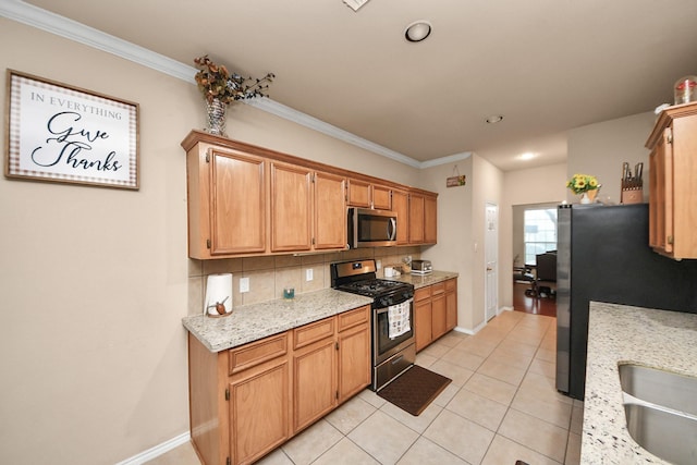 20310 Port Bishop Ln, Richmond, TX 77407 - kitchen featuring stainless steel appliances, light tile patterned floors, backsplash, ornamental molding, and recessed lighting